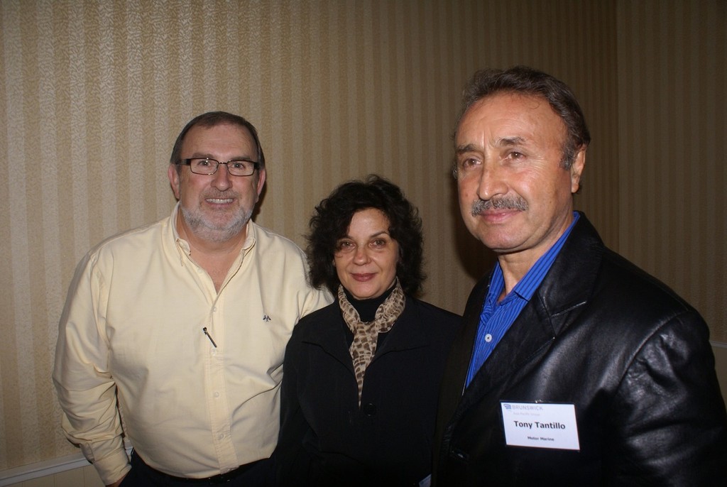 John Temple (left) with Townsville dealer Tony and Santina Tantillo, of Motor Marine. - The real McCoy © Bob Wonders